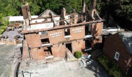 第六人因涉嫌克鲁克之家酒吧火灾而被捕